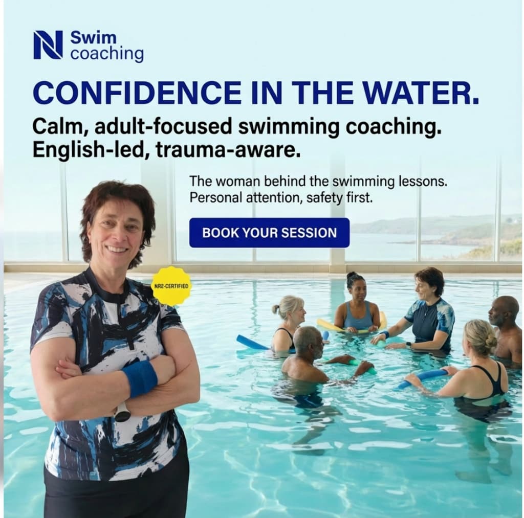 Swimming coach with adults in a pool, demonstrating calm adult-focused coaching.